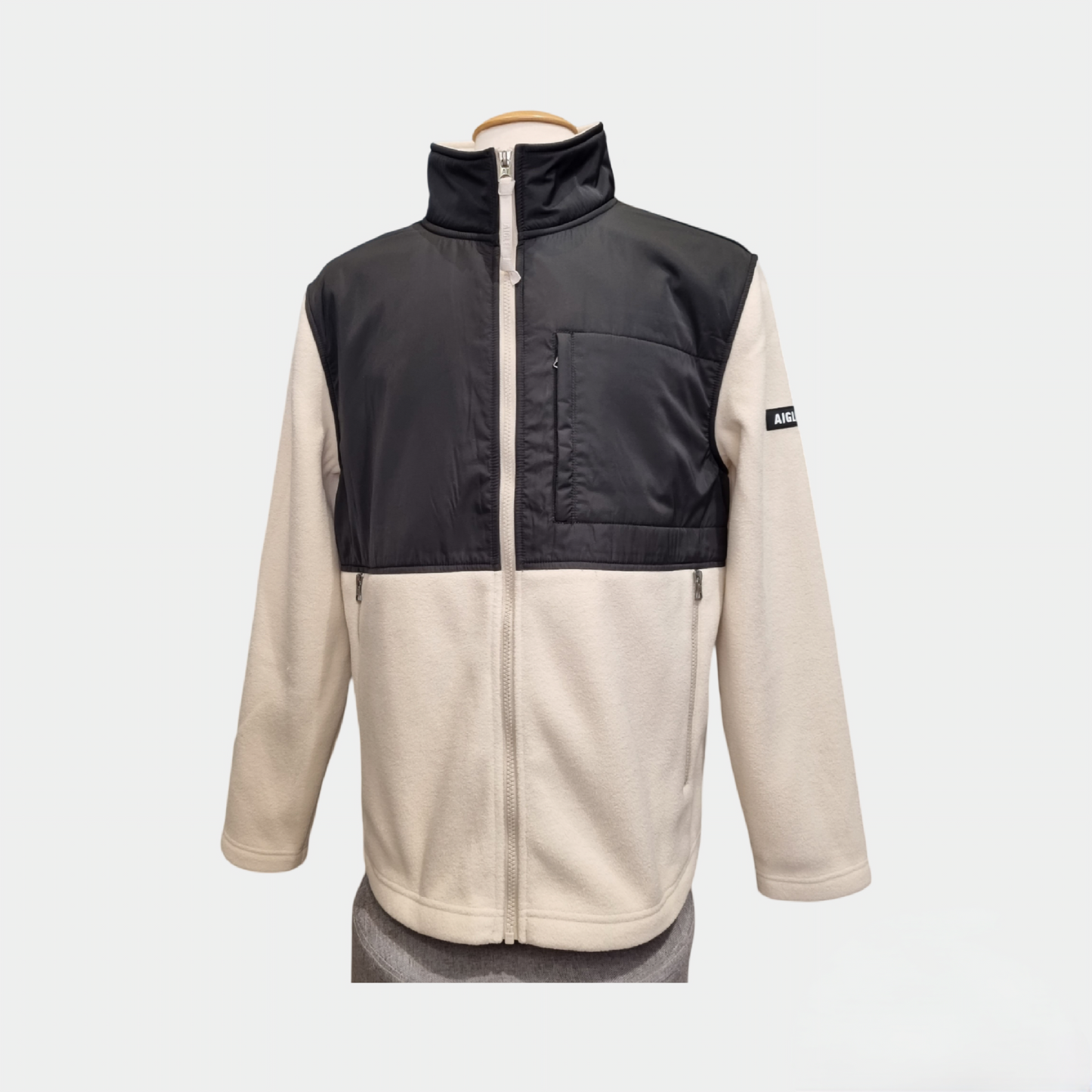 Polaire bicolore AIGLE 1853 noire et blanche avec fermeture zippée