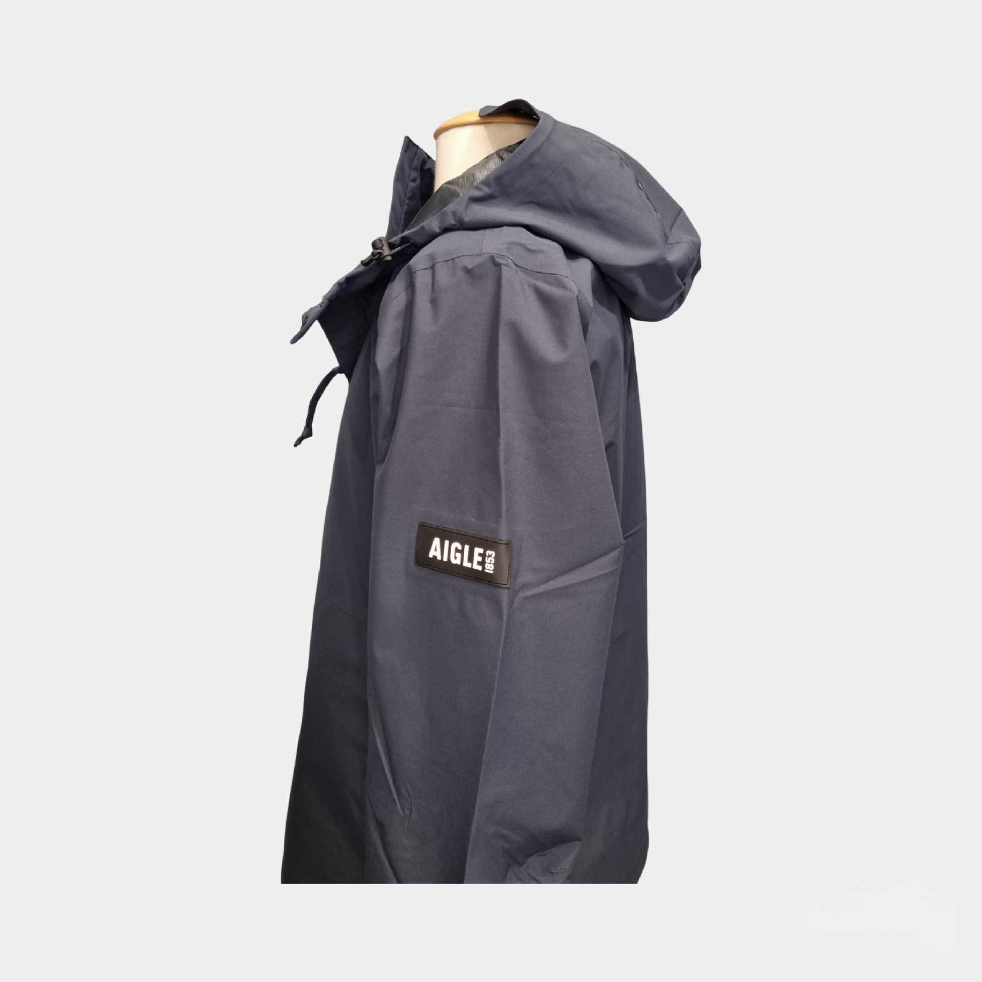 K-way AIGLE 1853 bleu, imperméable et déperlant, parfait pour l'outdoor

